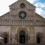The Cathedral of St. Anastasia  is the seat of the Archdiocese of Zadar, and the largest church in all of Dalmatia (the coastal region of Croatia). The church's origins date back to a Christian basilica built in the 4th and 5th centuries, while much of the currently standing building was constructed in the Romanesque style during the 12th and 13th centuries